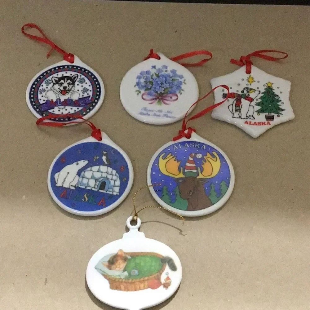 Set of six porcelain desk ornaments mostly Alaskan